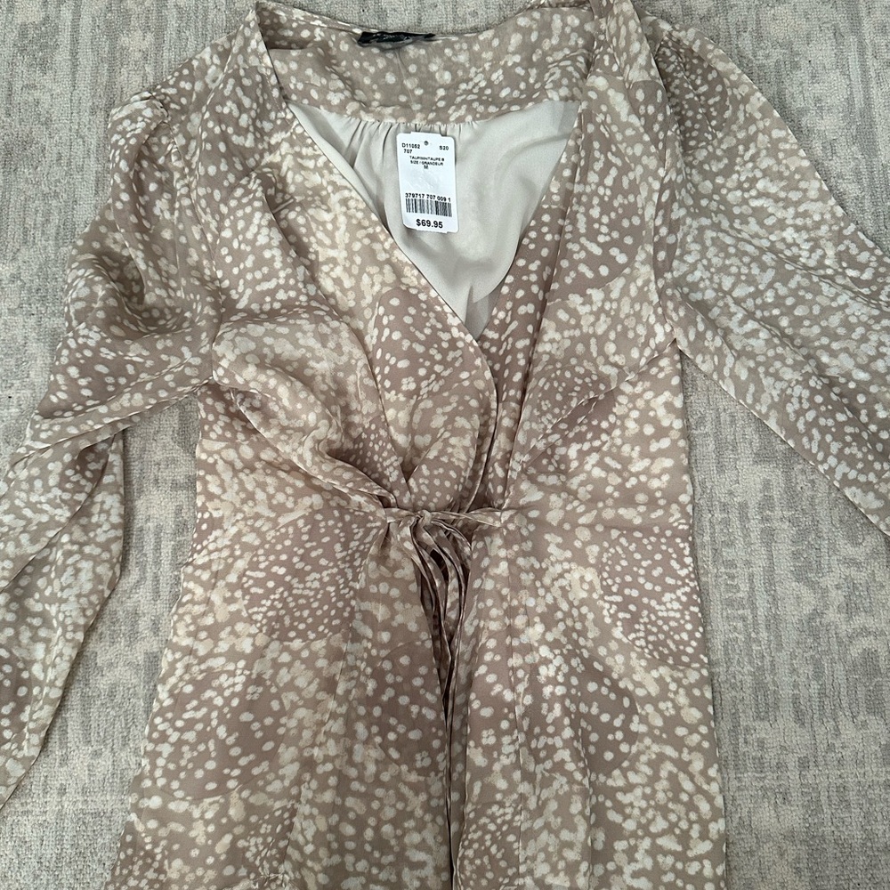Cross over women’s nude blouse - size M